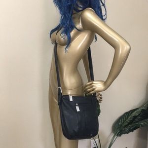 Black leather TIGNANELLO purse